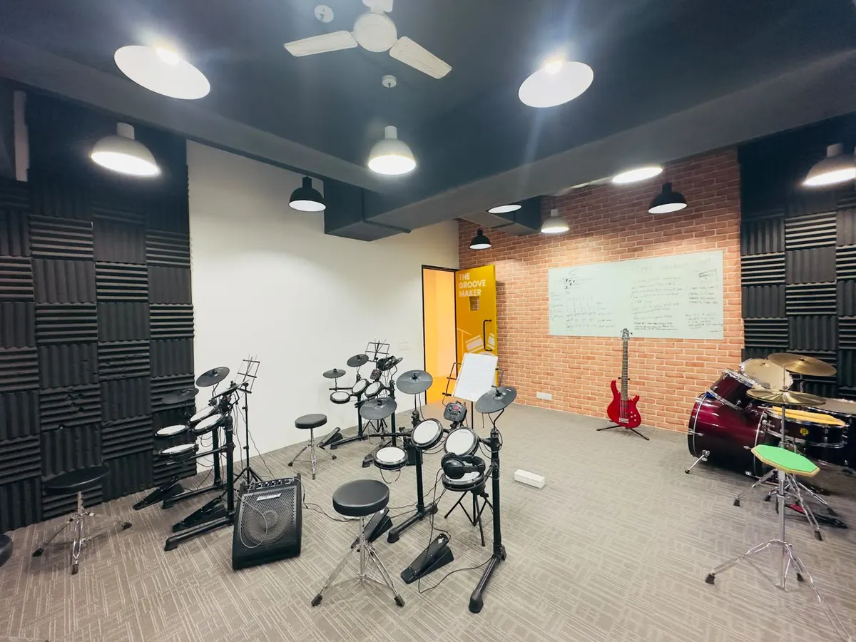 The drum room, with electronic kits and sound-absorbing walls